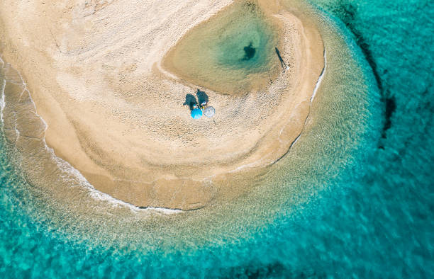 istock Unique round beach and blue sea, aerial view. 1265004506