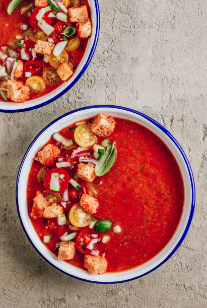 istock Spanish summer cold soup gazpacho with vegetables on concrete background. 1265004556