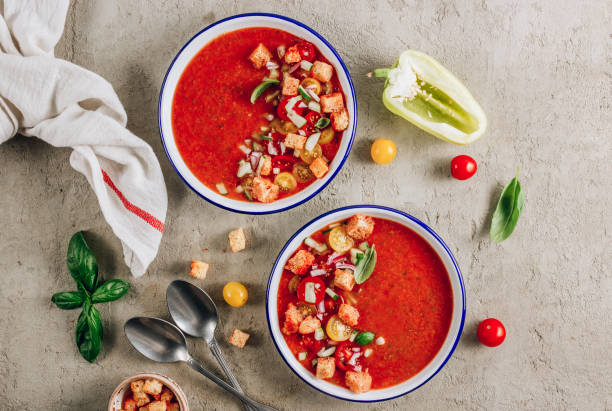 istock Spanish summer cold soup gazpacho with vegetables on concrete background. 1265004560