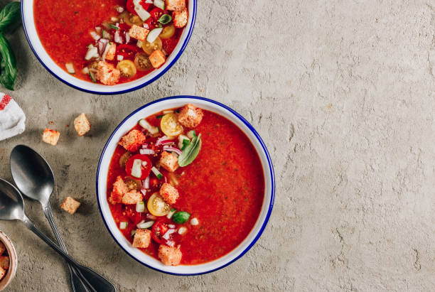 istock Spanish summer cold soup gazpacho with vegetables on concrete background. 1265004564