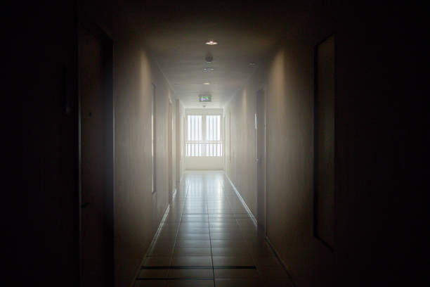 istock Dark and light corridor in the apartment. 1265008342
