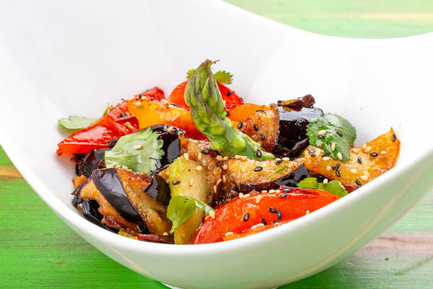 istock Eggplant Tempura with vegetables in Unagi sauce. Vegetarian dish. 1265008564