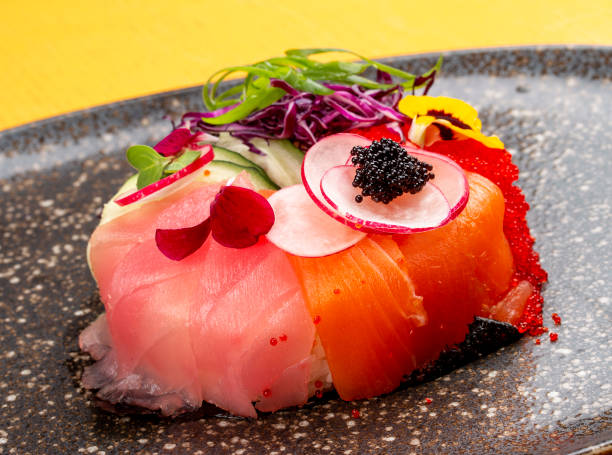 Sushi donut on a ceramic plate. Sushi trend. Creative food.