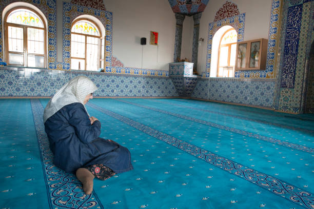 istock Muslim woman praying 1265012739