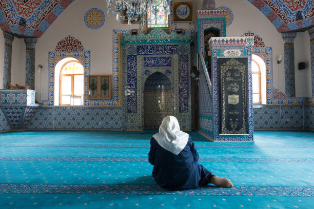 istock Muslim woman praying 1265012956