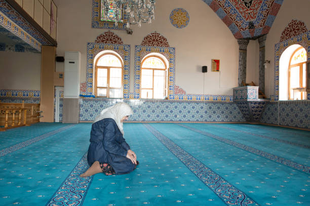 istock Muslim woman praying 1265013041