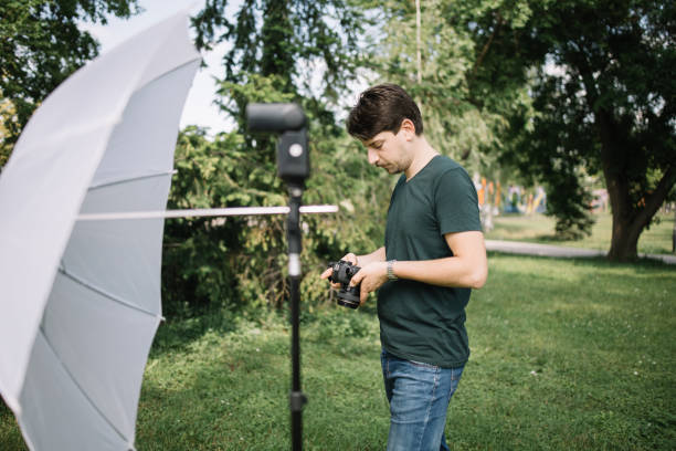 istock Portrait of man looking at camera while standing outdoor 1265013205