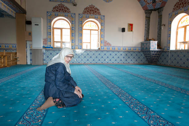istock Muslim woman praying 1265013261