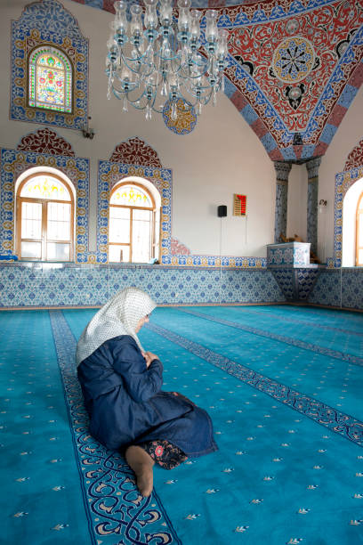 istock Muslim woman praying 1265013506