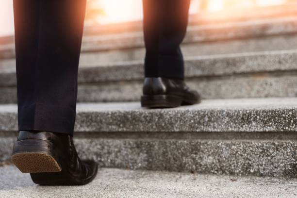 istock Image of a man walking up the stairs.concept successful. 1265014619