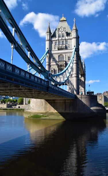 Tower Bridge and Thames, London, United Kingdom London, United Kingdom - May 29 2020: The Iconic Tower Bridge and River Thames, daytime view with blue sky waterloo bridge stock pictures, royalty-free photos & images