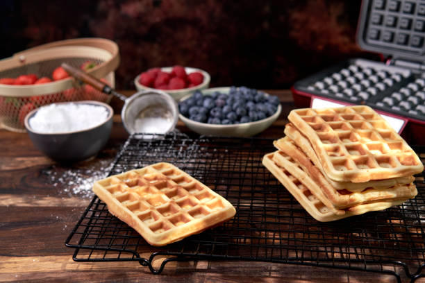 istock Making Waffles with Fresh Berries in Domestic Kitchen 1265017320