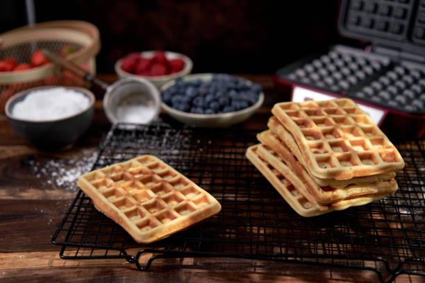 istock Making Waffles with Fresh Berries in Domestic Kitchen 1265017358