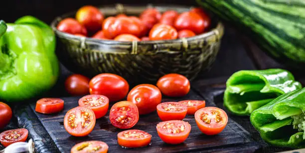 small red tomato used as a culinary ingredient in rustic cuisine, sliced "u200b"u200band diced tomatoes