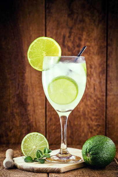 istock Caipirinha cocktail in glass on wooden table background. Copyspace, bar menu image, international caipirinha day, 13th September 1265018318
