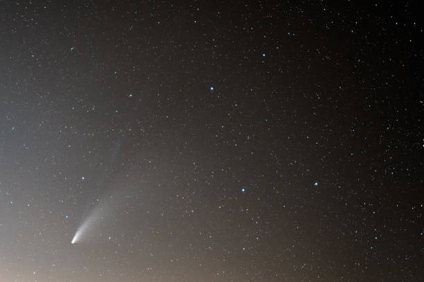 istock Neowise Comet and its two dust tails below Ursa Major 1265021744