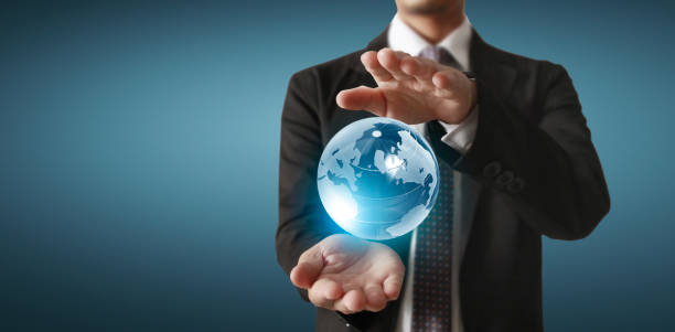 istock Globe ,earth in human hand, holding our planet glowing.  image provided by Nasa 1265023482