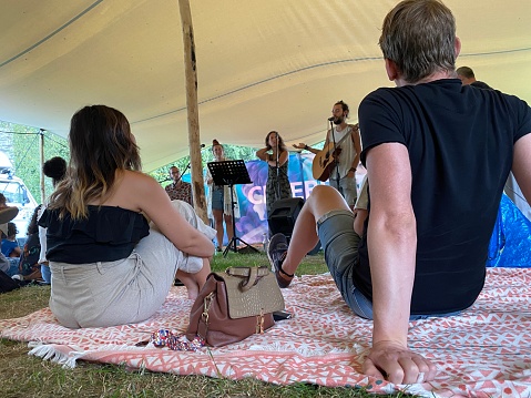 Schinnen, the Netherlands, - August 02, 2020. People coming together for an Outdoor  concert in the local Pentecostal Church, as you can see save social distancing is a must.