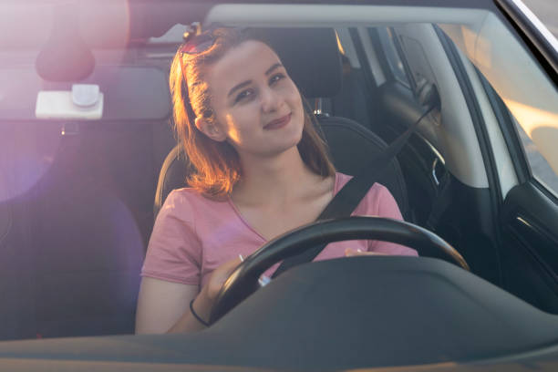 istock Driver portrait. A car happy woman. 1265028294