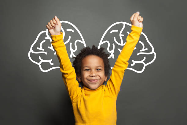istock Happy smart black child student boy with big brain 1265028871
