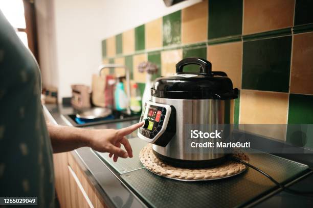 Cooking With An Automatic Pot Stock Photo - Download Image Now - Crock Pot, Cooking, Electricity