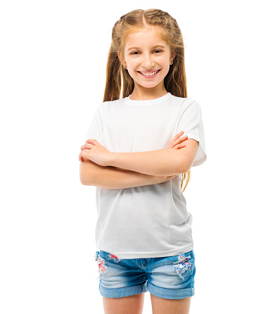 Portrait smart asian child girl crossed arms with looking at camera isolated on white background. Kid with confident gesture.