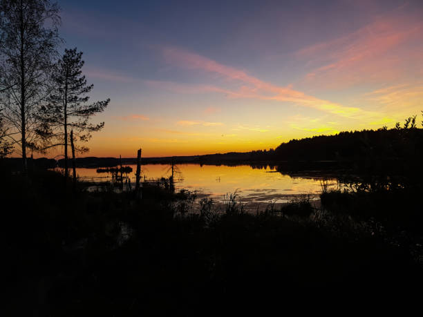 istock Colorful landscape with evening sunset on the lake. 1265030962