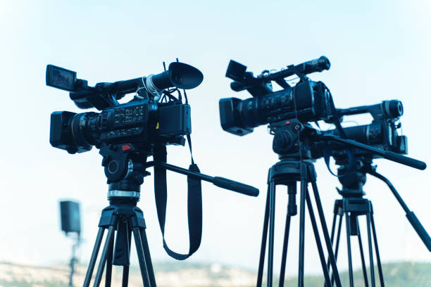 News conference. Filming an event with a video camera.