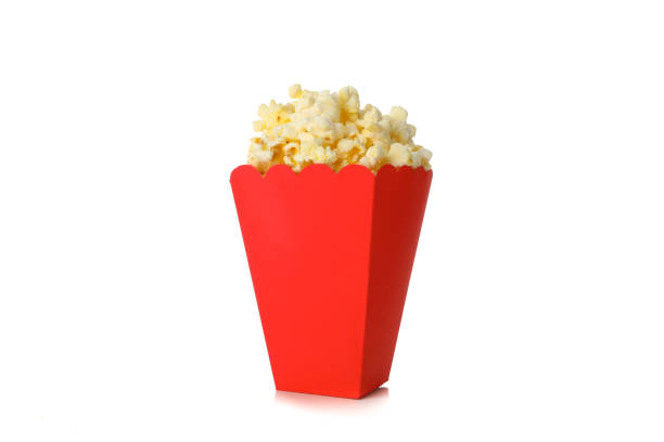 istock Tasty popcorn in cardboard box isolated on white background 1265031662