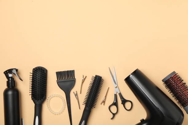 istock Composition with hairdresser accessories on beige background, space for text 1265031870