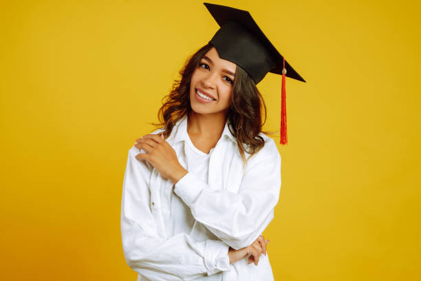 istock African American woman posing on a yellow background. 1265032420