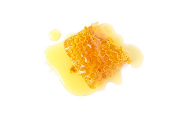 istock Fresh honeycomb piece isolated on white background 1265033692