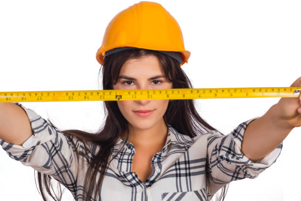 istock Architect woman holding a measuring tape. 1265033808