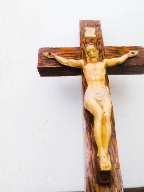 Holy cross in a white background.with god jesus hanging on it.The God jesus who got crucified in the cross is shown. Holy cross with God jesus laying on a white background.Can see the crucified jesus on the holy cross. what mountain was jesus crucified on stock pictures, royalty-free photos & images