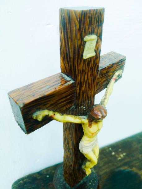 Holy cross in a white background.with god jesus hanging on it.The God jesus who got crucified in the cross is shown. Holy cross in a white background with god jesus hanging on it.The god jesus who got crucified in the cross is shown. what mountain was jesus crucified on stock pictures, royalty-free photos & images