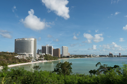 Tumon Bay, on the US island territory of Guam, draws tourists from all over. Guam is known for its beautiful beaches and clear ocean water. Guam also played an important role during World War 2.
