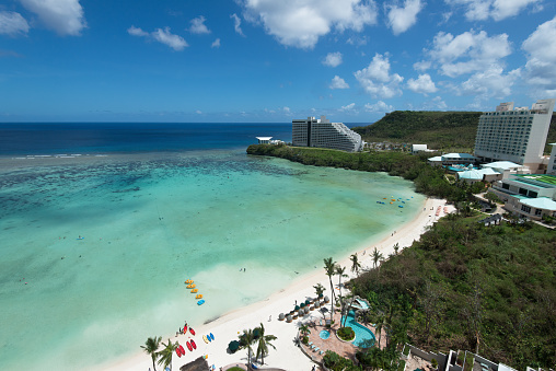 Tumon Bay, on the US island territory of Guam, draws tourists from all over. Guam is known for its beautiful beaches and clear ocean water. Guam also played an important role during World War 2.