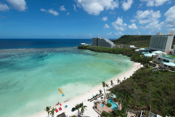 Tumon Bay, Guam Tumon Bay, on the US island territory of Guam, draws tourists from all over. Guam is known for its beautiful beaches and clear ocean water. Guam also played an important role during World War 2. guam stock pictures, royalty-free photos & images