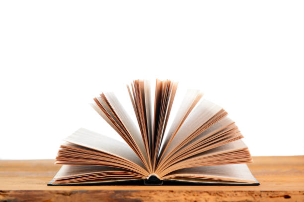 istock old book on a wooden table 1265040511