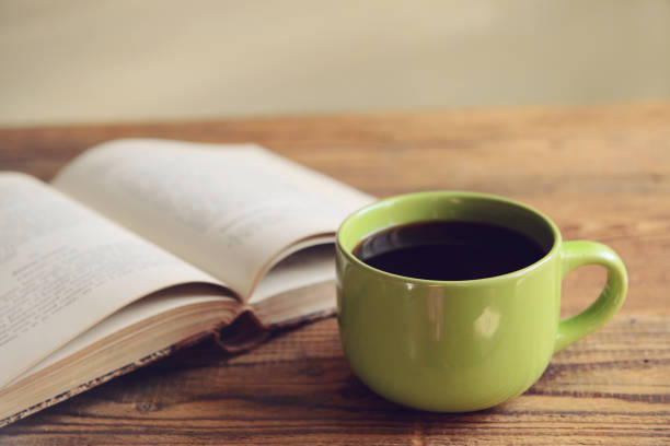 istock old book and coffee on a wooden table 1265040700