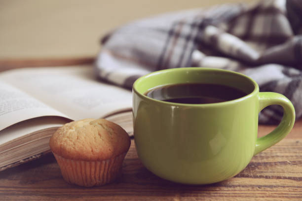 istock old book and coffee on a wooden table 1265040769