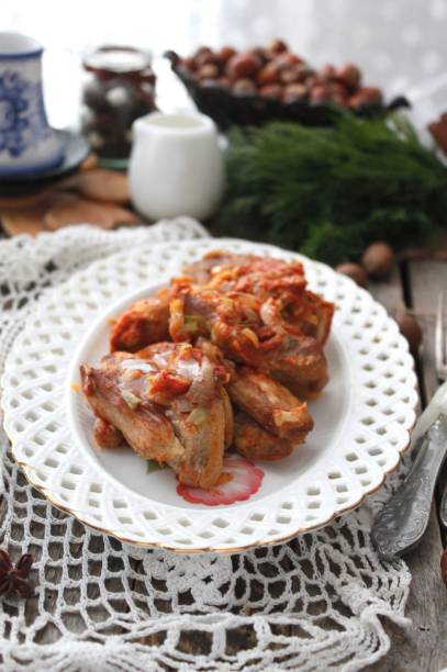istock stewed ribs in tomato with onion 1265043532