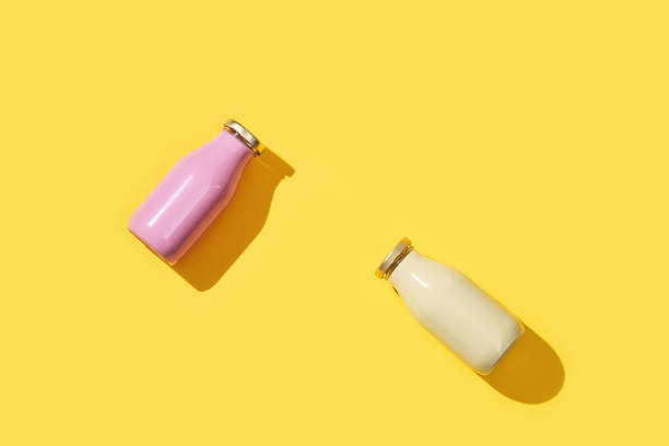 istock Two small glass bottles for juice or yogurt, packaging template mock up 1265044235