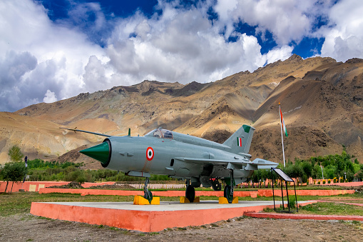 Kargil, Jammu and Kashmir,India - September 1ST 2014 : A MIG-21 fighter plane used by India in Kargil war 1999 (Operation Vijay), between Pakistan and India, Himalayan mountain in backgroud.