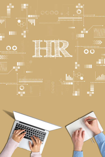 istock Hands with notebook and diary on beige background with the inscription HR. 1265045429