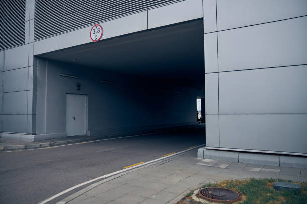istock Tunnel with asphalt road at airport territory 1265045677