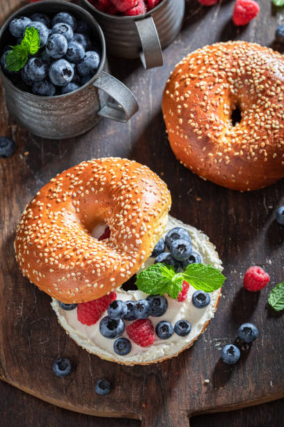 istock Sweet bagel with raspberries and blueberries for quick lunch 1265045947