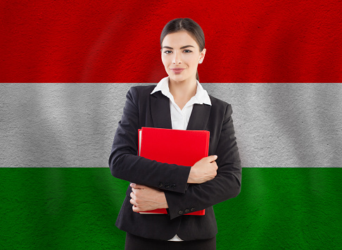 Young Woman with red notebook. Education or business concept