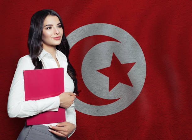 istock Young woman with red book. Learn or business concept 1265046571
