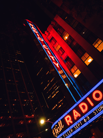Music radio city hall neon signboard beautifully glowing at night in New York City